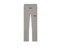 FEAR OF GOD Essentials pants. Colored grey.