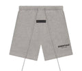 FEAR OF GOD Essentials shorts. Colored grey.