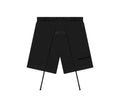 FEAR OF GOD Essentials shorts. Colored black.