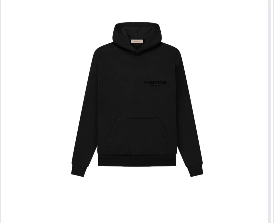 FEAR OF GOD Essentials hoodie. Colored black.